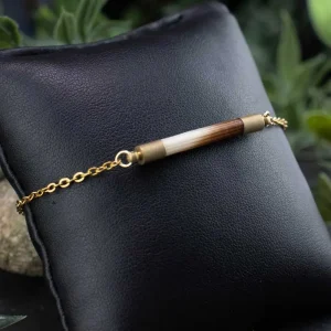 Side view of the quill bangle, showcasing the slim profile and the elegant, organic curve of the natural porcupine quill.